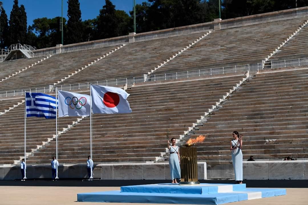 Flacăra olimpică a plecat spre Tokyo pe calea aerului. Ceremonia nu a avut spectatori